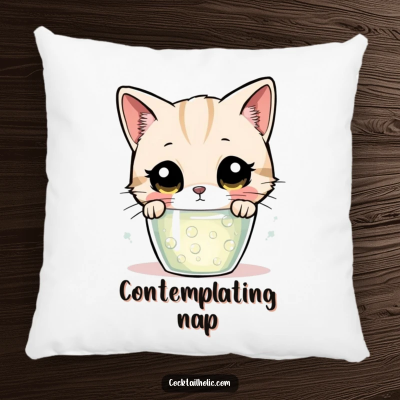 Funny cat pillow, with large, curious eyes, intently watching a glass of fizzing, mysterious liquid.