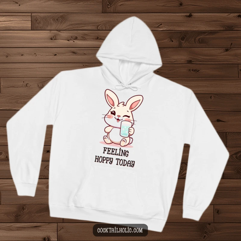 Funny rabbit hoodie with a cheerful character winking and holding a frosted glass, blending cozy comfort with playful humor.