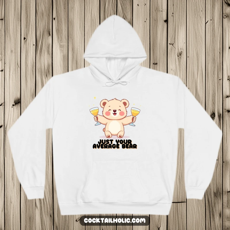 Funny hoodie with a joyful bear cub juggling glowing cocktail glasses, perfect for staying warm and amused.