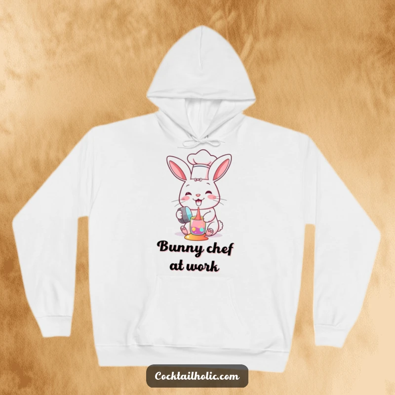 Funny hoodie with a cheerful bunny chef accidentally spilling colorful liquids from a shaker, perfect for cozy kitchen vibes.