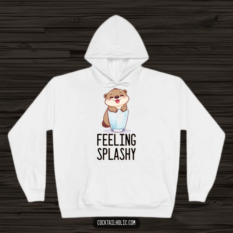 Funny otter grinning while sliding down an ice cube into a glass, depicted on a cozy hoodie.