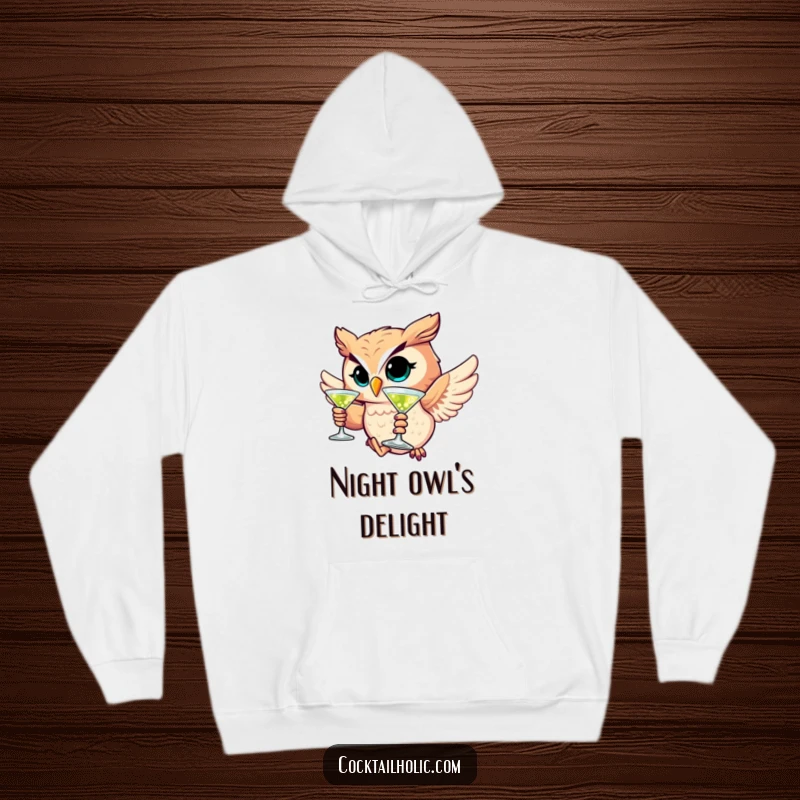 Funny hoodie with a winking owl character soaring while holding a martini, a cozy and humorous apparel choice.