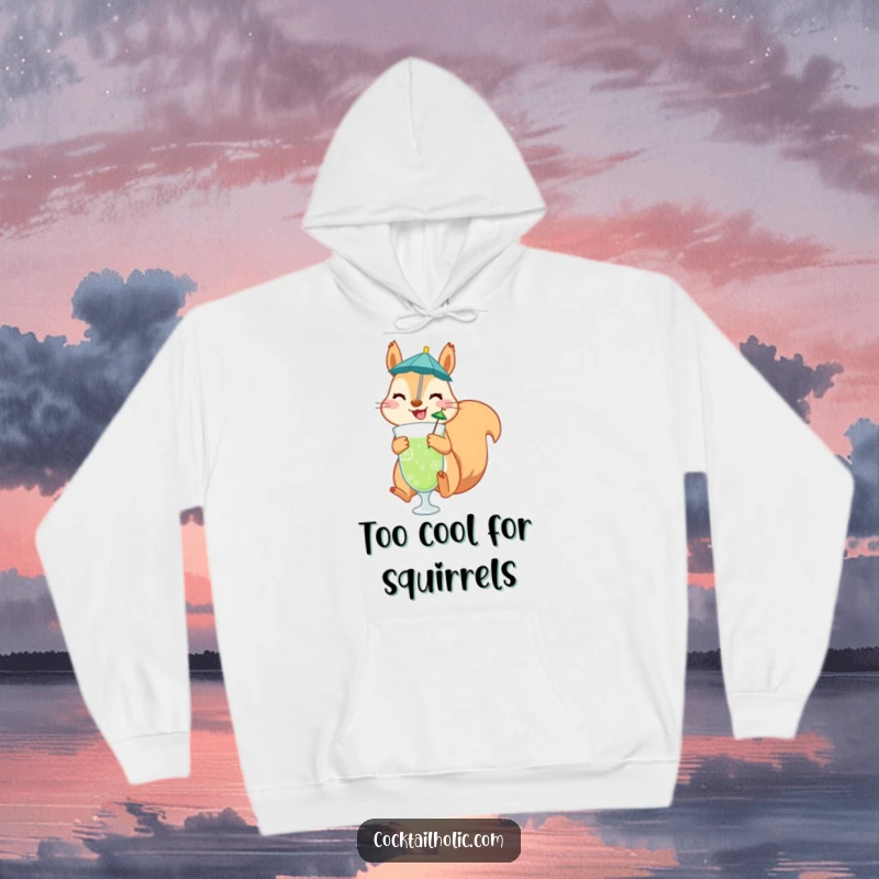 Funny hoodie depicting a jubilant squirrel mid-air with a drink umbrella, perfect for cozying up with a humorous vibe.