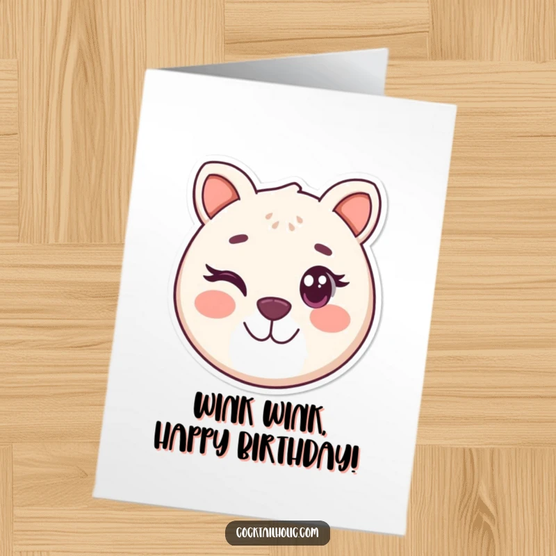 Funny Free Printable Birthday Card: Round, smiling animal face playfully winks one eye, sending birthday cheer.