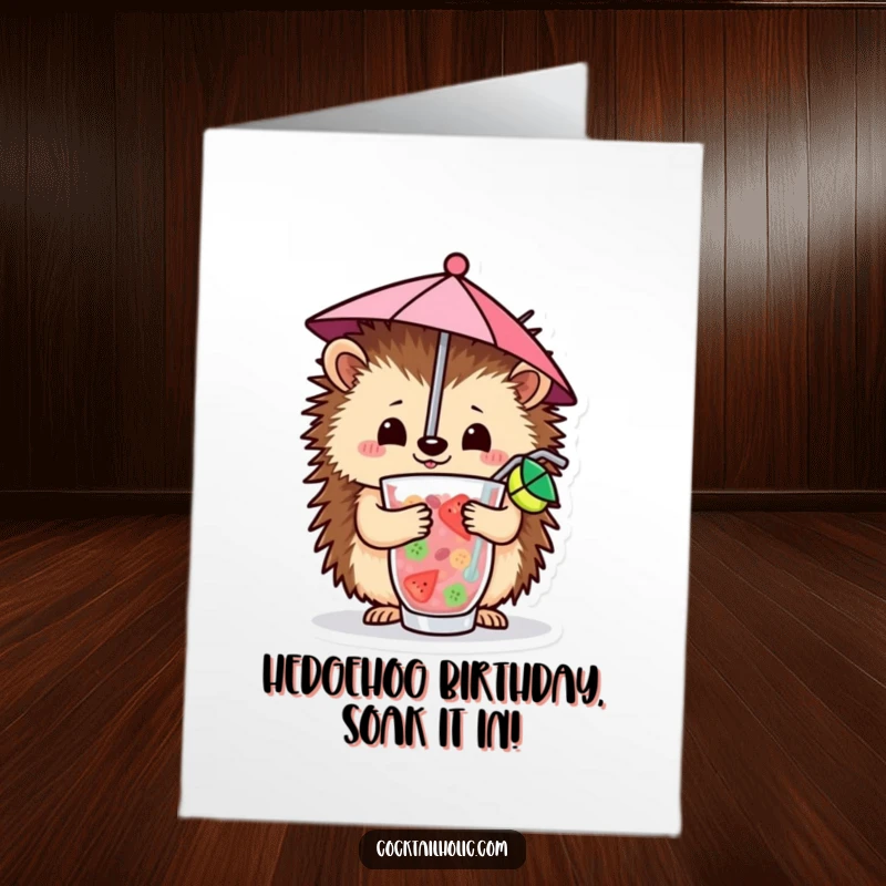 Funny Free Printable Birthday Card: A cheerful hedgehog balancing a tiny umbrella in a fruity drink.