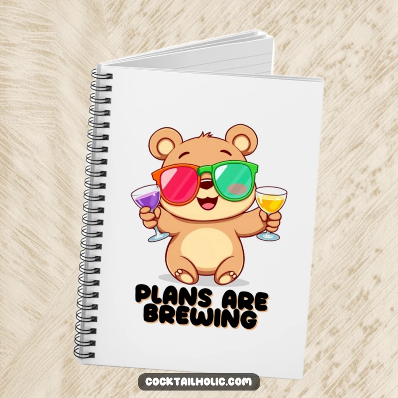 Funny Notebook cover depicting a rosy-cheeked cartoon bear adeptly juggling colorful cocktail glasses, inspiring creativity and humorous note-taking.
