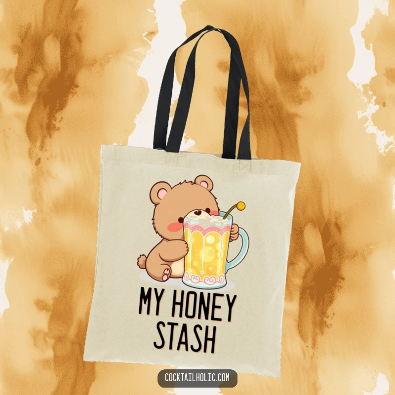 Funny Tote Bag showcasing a giggling bear cub sneaking a sip from a large, decorative cocktail mug, perfect for everyday use.